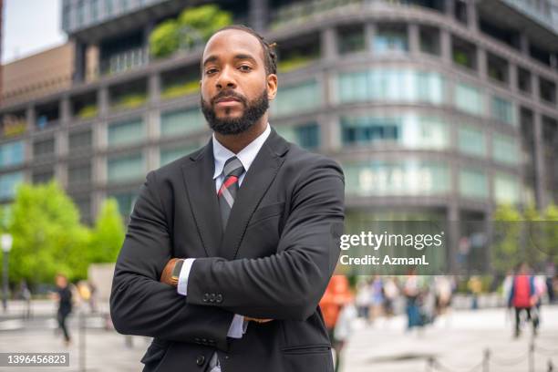 african american male lawyer opens a new firm in the city - ekonom bildbanksfoton och bilder