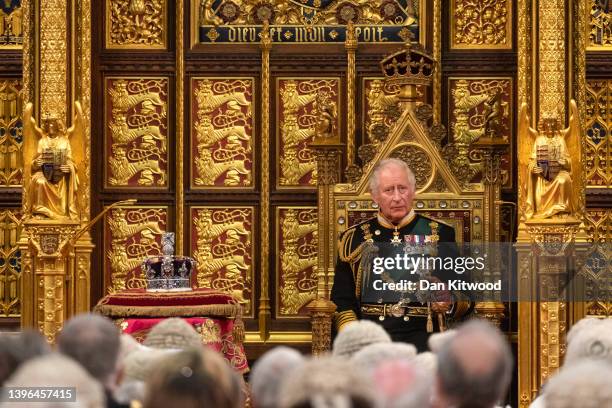 Prince Charles, Prince of Wales sits by the Imperial State Crown as he delivers the Queen’s Speech during the state opening of Parliament at the...