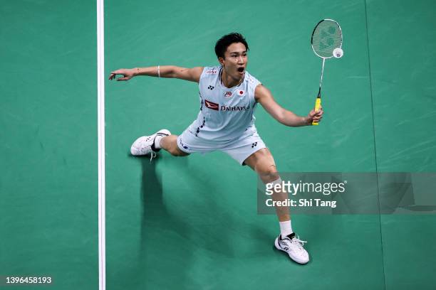 Kento Momota of Japan competes in the Men's Single match against Toby Penty of England during day three of the BWF Thomas and Uber Cup Finals at...