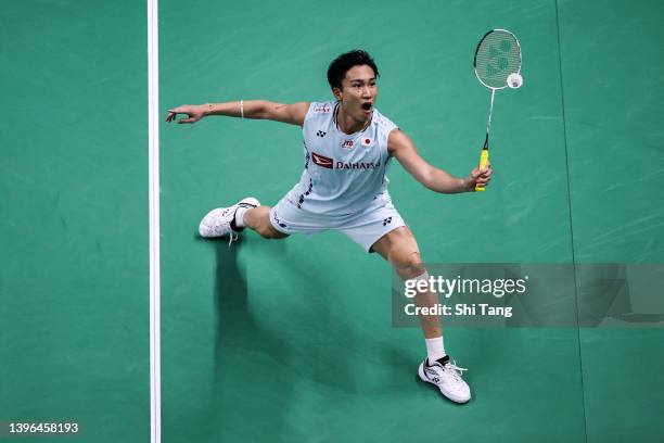 Kento Momota of Japan competes in the Men's Single match against Toby Penty of England during day three of the BWF Thomas and Uber Cup Finals at...