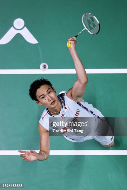 Kento Momota of Japan competes in the Men's Single match against Toby Penty of England during day three of the BWF Thomas and Uber Cup Finals at...