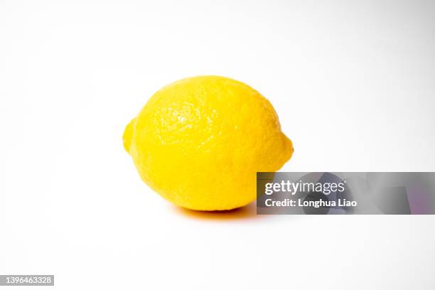 a lemon - lemon stock pictures, royalty-free photos & images