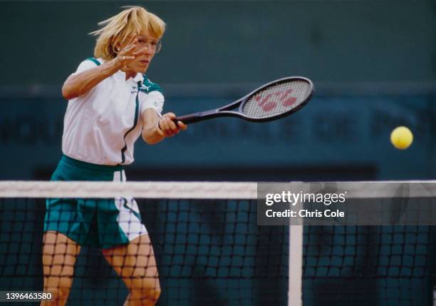 Martina Navratilova from the United States plays a forehand return against Steffi Graf of Germany during their Women's Singles Final match at the...