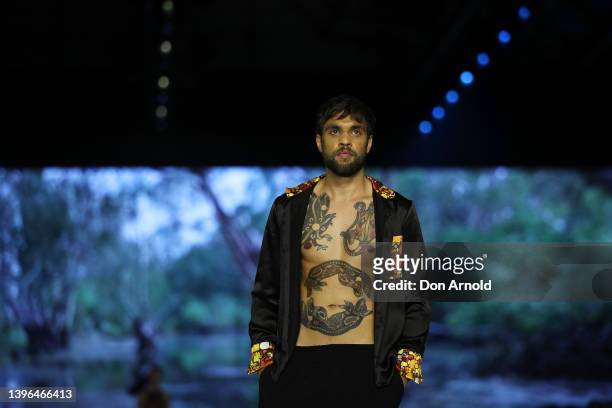 Model walks the runway during the Indigenous Fashion Projects show during Afterpay Australian Fashion Week 2022 Resort '23 Collection at...