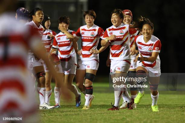 Japan celebrate winning the Women's International Test match between the Australia Wallaroos and Japan at Bond University on May 10, 2022 in Gold...