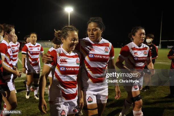 Japan celebrate winning the Women's International Test match between the Australia Wallaroos and Japan at Bond University on May 10, 2022 in Gold...