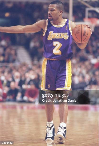 Guard Derek Fisher of the Los Angeles Lakers walks down the court during a game against the Chicago Bulls at the United Center in Chicago, Illinois....