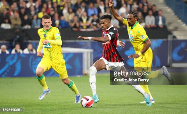 Hicham Boudaoui of Nice between Quentin Merlin, Samuel Moutoussamy of Nantes during the French Cup Final between OGC Nice and FC Nantes at Stade de...