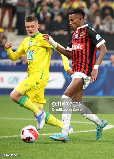 Hicham Boudaoui of Nice, Quentin Merlin of Nantes during the French Cup Final between OGC Nice and FC Nantes at Stade de France on May 7, 2022 in...