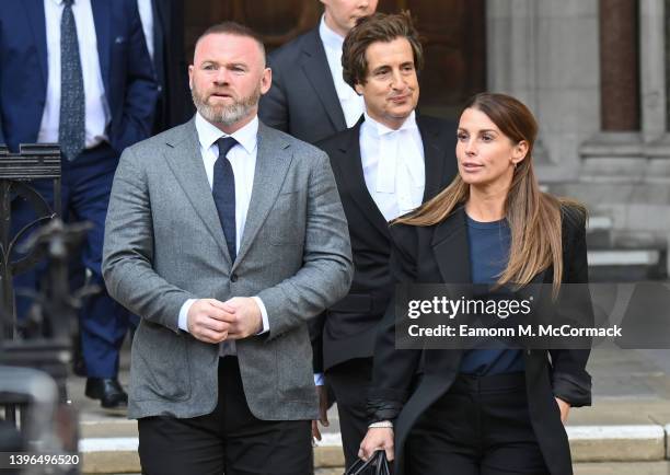 Wayne Rooney and Coleen Rooney depart the Royal Courts of Justice, Strand on May 10, 2022 in London, England. Coleen Rooney, wife Derby County...