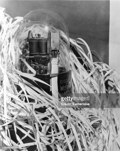 Indica frelsen cowboy Shot of old stock ticker tape machine with lots of printed tape... News  Photo - Getty Images