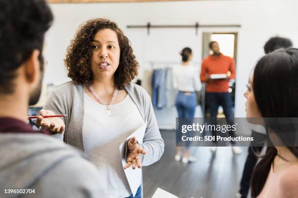 director meets with young adults - casting director stock pictures, royalty-free photos & images