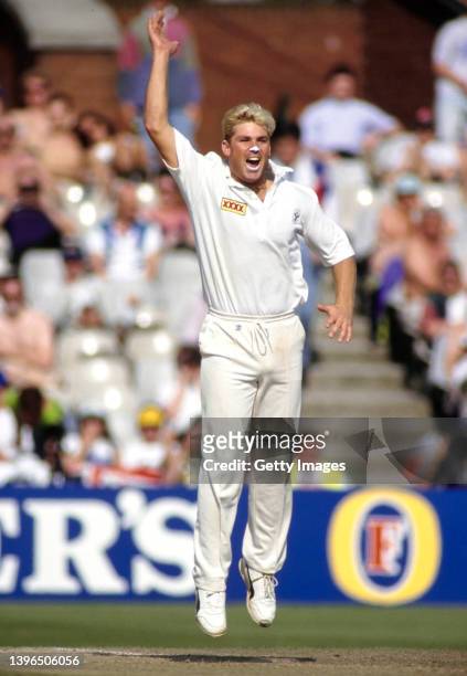 Australia leg spinner Shane Warne celebrates after taking a wicket during the First Ashes Test Match against England at Old Trafford, on June 4th,...