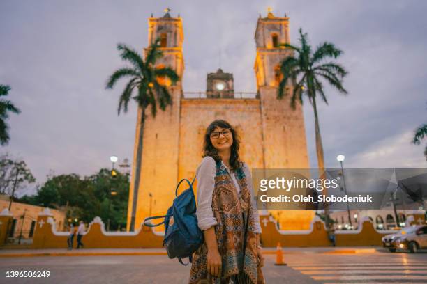 woman looking at  church in valladolid town, mexico - mexico city tourist stock pictures, royalty-free photos & images