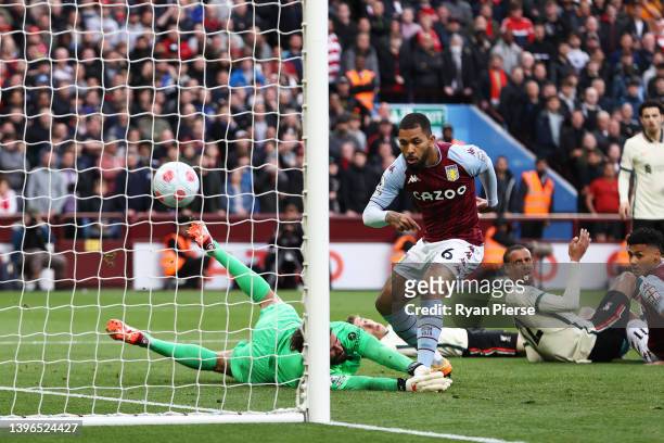 Douglas Luiz of Aston Villa scores their team's first goal during the Premier League match between Aston Villa and Liverpool at Villa Park on May 10,...