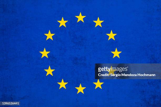 flag of the european union, eu, with a grunge texture - european flag stockfoto's en -beelden