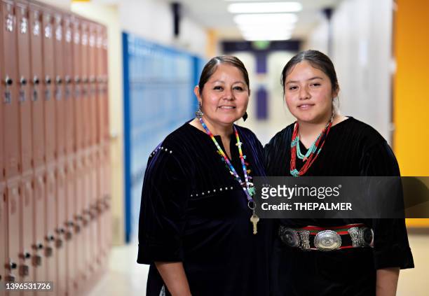 teacher and student portrait on school corridor - native american reservation stockfoto's en -beelden