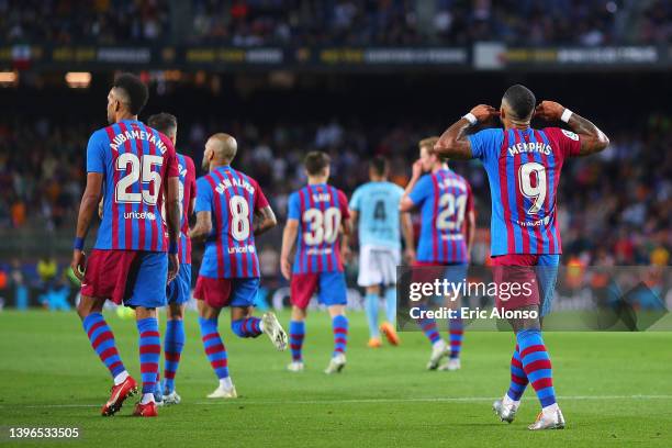 Memphis Depay FC Barcelona celebrates scoring his side's first goal during the La Liga Santader match between FC Barcelona and RC Celta de Vigo