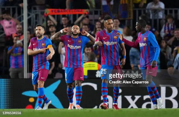 Memphis Depay of FC Barcelona celebrates after scoring their team's first goal during the La Liga Santander match between FC Barcelona and RC Celta...