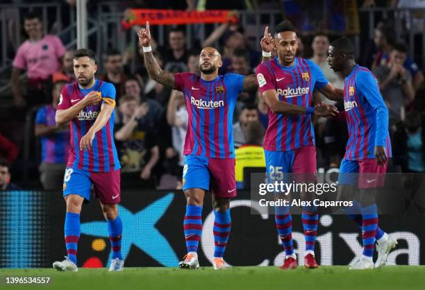 Memphis Depay of FC Barcelona celebrates after scoring their team's first goal during the La Liga Santander match between FC Barcelona and RC Celta...