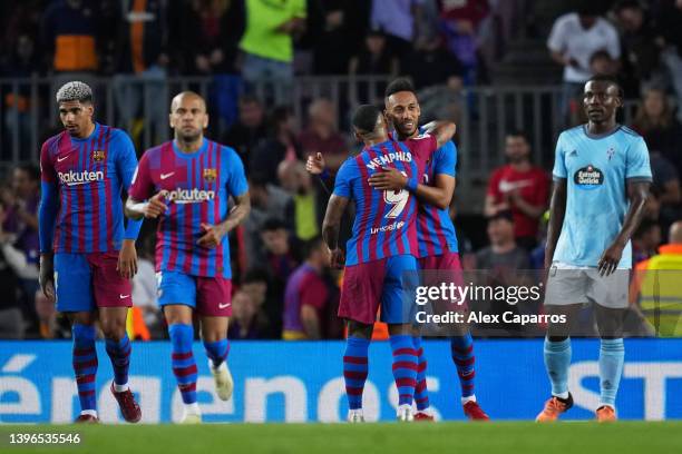 Pierre-Emerick Aubameyang of FC Barcelona celebrates with Memphis Depay of FC Barcelona after scoring their team's second goal during the La Liga...