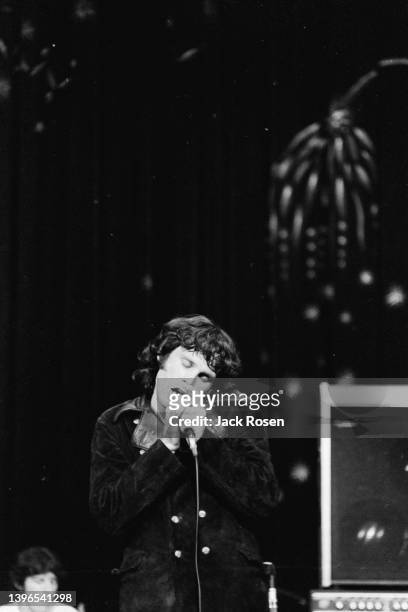 American Rock singer Jim Morrison , of the group the Doors, performs onstage at Town Hall, Philadelphia, Pennsylvania, June 18, 1967. Partially...