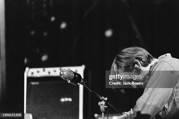 American Rock musician Ray Manzarek , of the group the Doors, plays keyboards as he performs onstage at Town Hall, Philadelphia, Pennsylvania, June...