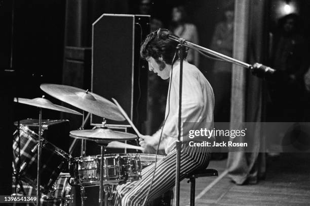 American Rock musician John Densmore, of the group the Doors, plays drums as he performs onstage at Town Hall, Philadelphia, Pennsylvania, June 18,...