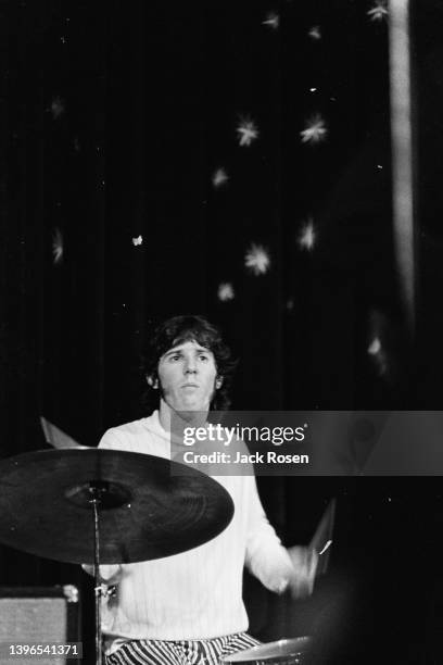 American Rock musician John Densmore, of the group the Doors, plays drums as he performs onstage at Town Hall, Philadelphia, Pennsylvania, June 18,...