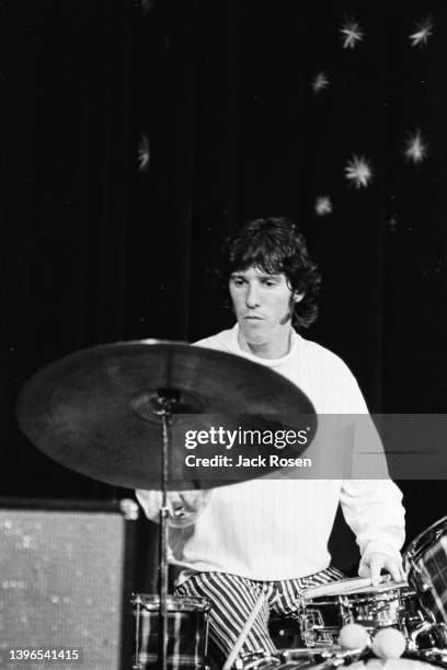 American Rock musician John Densmore, of the group the Doors, plays drums as he performs onstage at Town Hall, Philadelphia, Pennsylvania, June 18,...