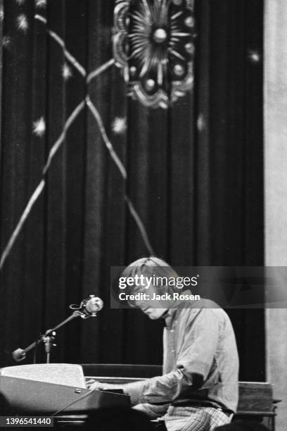 American Rock musician Ray Manzarek , of the group the Doors, plays keyboards as he performs onstage at Town Hall, Philadelphia, Pennsylvania, June...