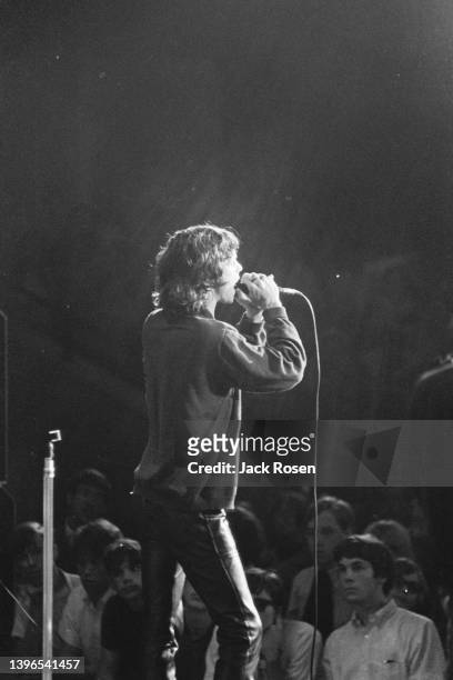 American Rock singer Jim Morrison , of the group the Doors, performs onstage at Town Hall, Philadelphia, Pennsylvania, June 18, 1967.