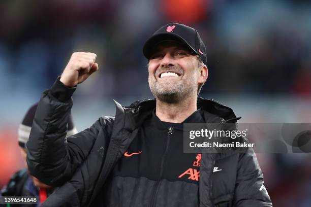 Juergen Klopp, Manager of Liverpool celebrates with the fans after their sides victory during the Premier League match between Aston Villa and...