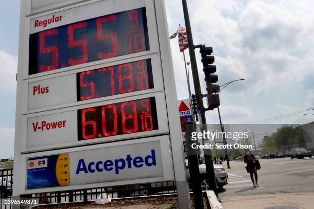 Sign displays gas prices at a gas station on May 10, 2022 in Chicago, Illinois. Nationwide, the average price for a gallon of regular gasoline...