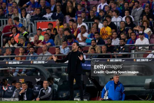 Xavi Hernandez, Manager of FC Barcelona reacts during the LaLiga Santander match between FC Barcelona and RC Celta de Vigo at Camp Nou on May 10,...