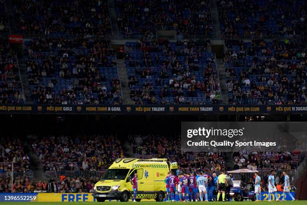 Ronald Araujo of FC Barcelona receives medical attention during the LaLiga Santander match between FC Barcelona and RC Celta de Vigo at Camp Nou on...