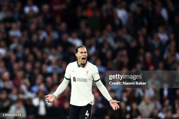 Virgil van Dijk of Liverpool reacts during the Premier League match between Aston Villa and Liverpool at Villa Park on May 10, 2022 in Birmingham,...