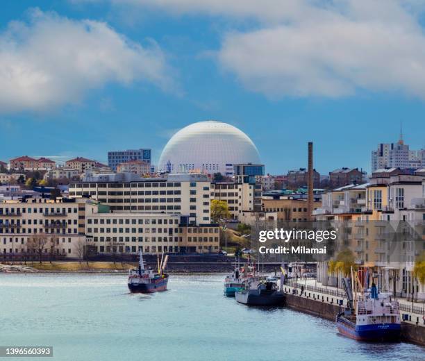 stockholm - ericsson globe arena sweden. view of river. - stockholm stockfoto's en -beelden