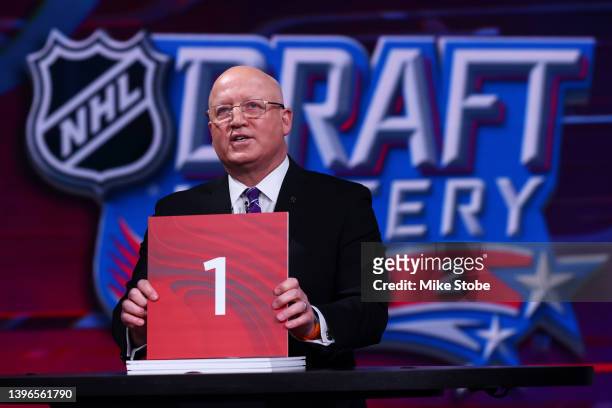 National Hockey League Deputy Commissioner Bill Daly announces draft position during the 2022 NHL Draft Lottery on May 10, 2022 at the NHL Network's...