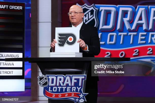 National Hockey League Deputy Commissioner Bill Daly announces the Philadelphia Flyers overall draft position during the 2022 NHL Draft Lottery on...