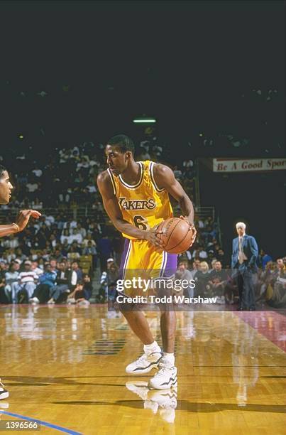 Guard Eddie Jones of the Los Angeles Lakers holds the ball during a game against the Dallas Mavericks at the Selland Arena in Frenso, California. The...