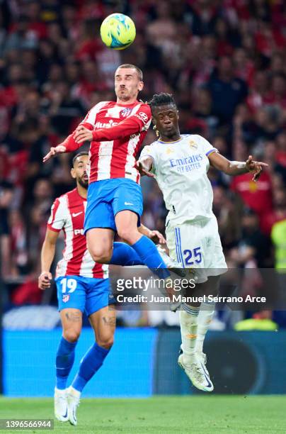 Eduardo Camavinga of Real Madrid duels for the ball with Antoine Griezmann of Club Atletico de Madrid during the La Liga Santander match between Club...