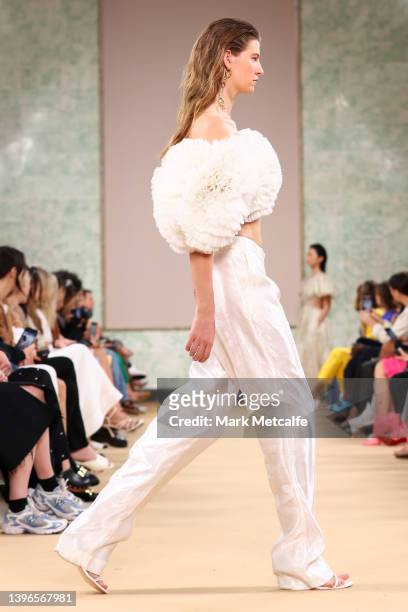 Model walks the runway during the Aje show during Afterpay Australian Fashion Week 2022 Resort '23 Collections at the Museum of Contemporary Art on...
