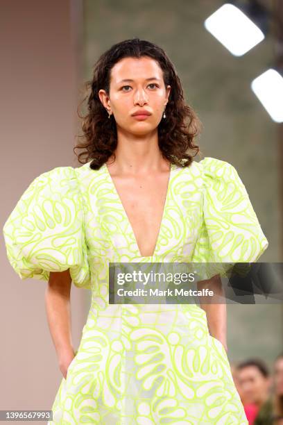 Model walks the runway during the Aje show during Afterpay Australian Fashion Week 2022 Resort '23 Collections at the Museum of Contemporary Art on...