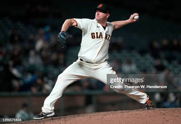 Jake McGee of the San Francisco Giants pitches against the Colorado Rockies in the top of the ninth inning at Oracle Park on May 09, 2022 in San...