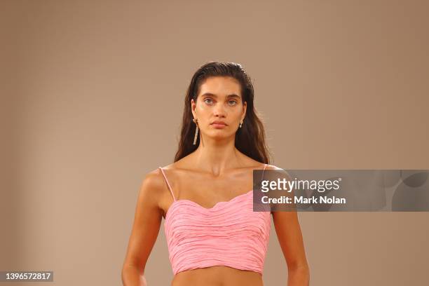Model walks the runway during the Aje show during Afterpay Australian Fashion Week 2022 Resort '23 Collections at the Museum of Contemporary Art on...