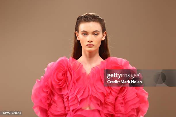 Model walks the runway during the Aje show during Afterpay Australian Fashion Week 2022 Resort '23 Collections at the Museum of Contemporary Art on...