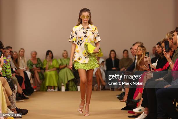 Model walks the runway during the Aje show during Afterpay Australian Fashion Week 2022 Resort '23 Collections at the Museum of Contemporary Art on...