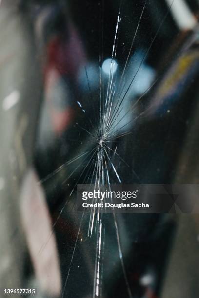 broken glass - breaking window stockfoto's en -beelden