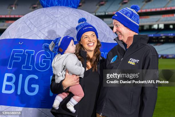 Neale Daniher poses for a photograph with daughter Bec Daniher and granddaughter Billie Daniher during the FightMND Launch Of The Big Freeze 8...